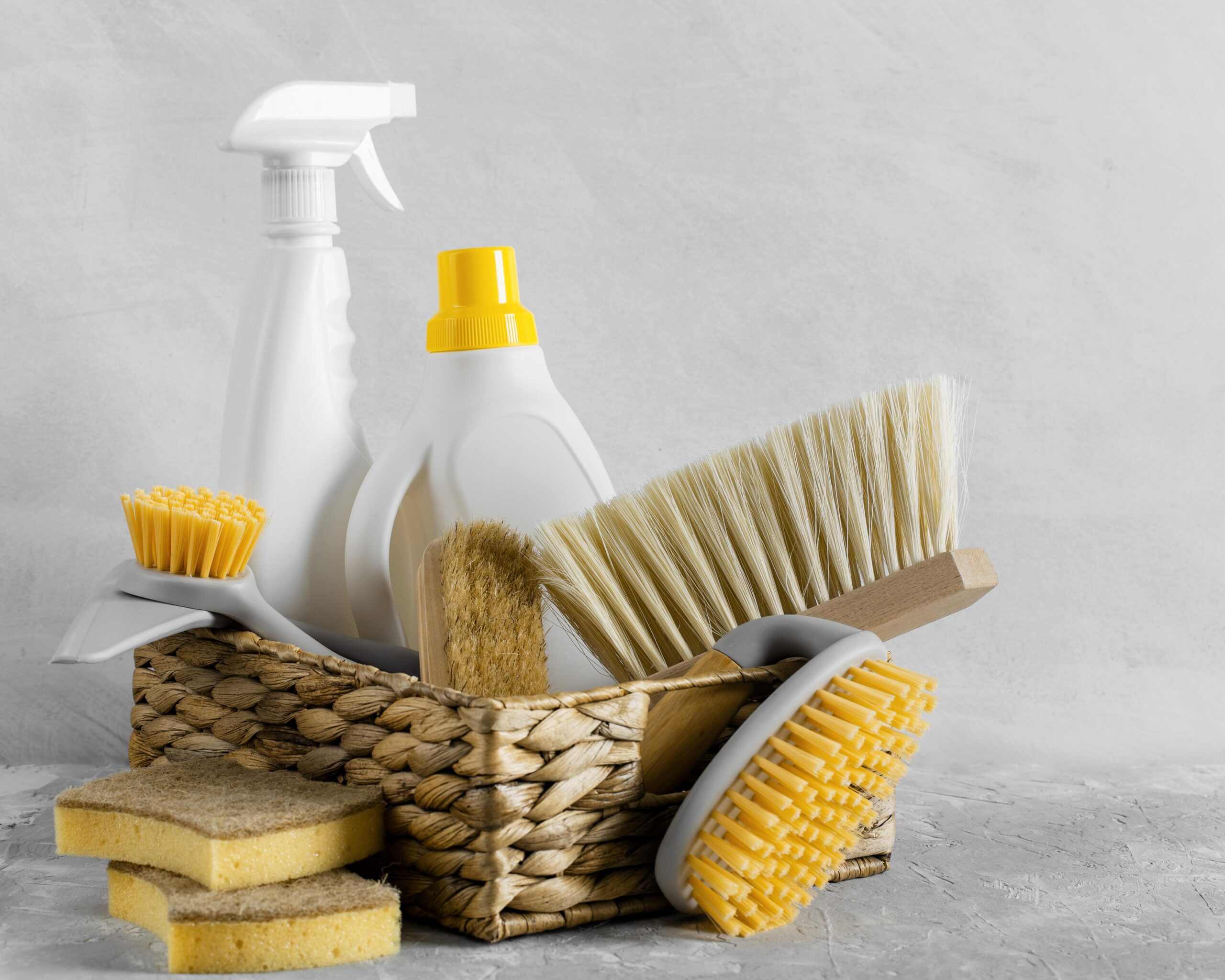 front-view-eco-friendly-cleaning-brushes-basket-with-solution